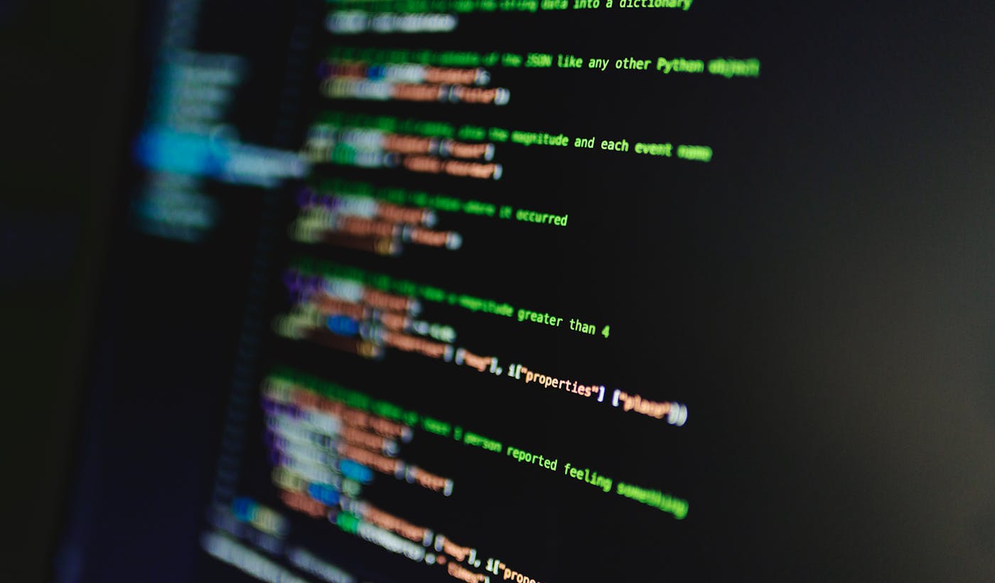 Colorful lines of code on a screen to illustrate fixing mixed content