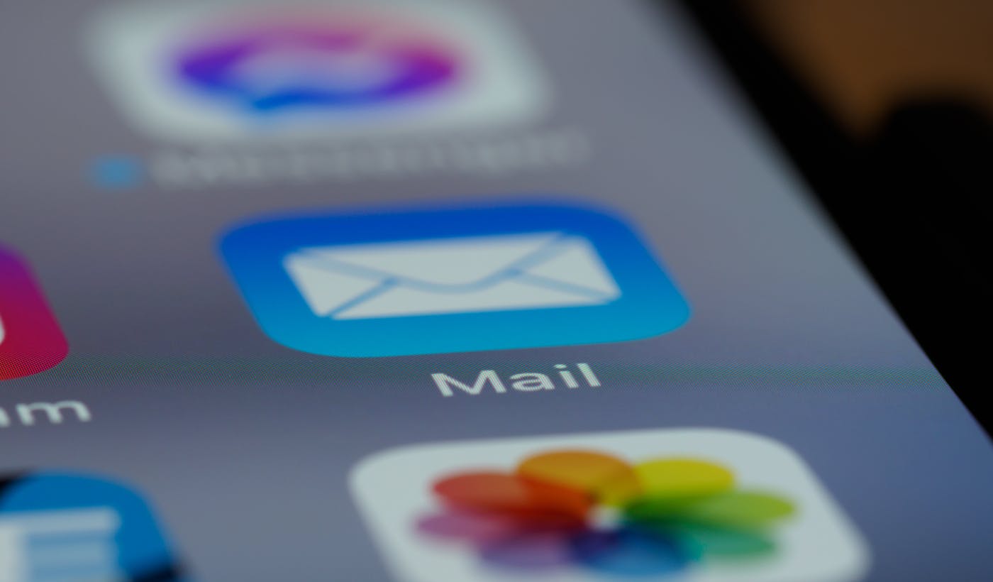 Close-up of a mail application icon on a smartphone screen